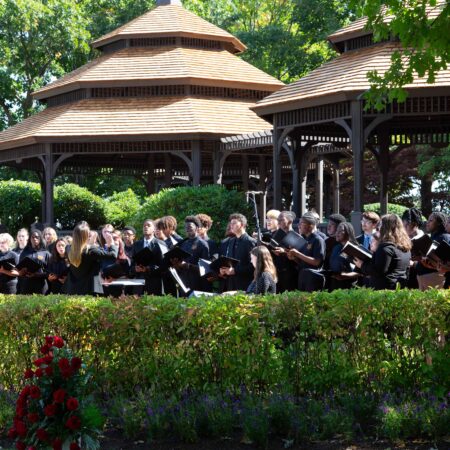 a group of people in black clothes