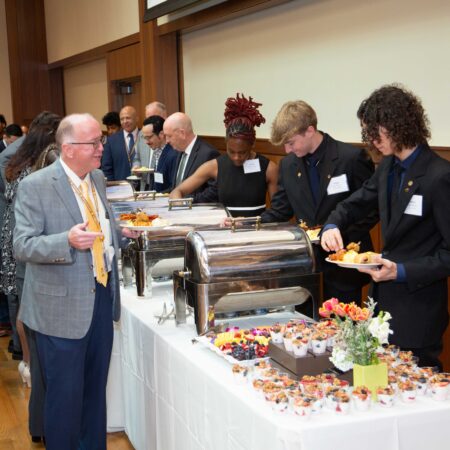 a group of people at a buffet