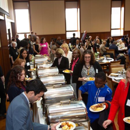 a group of people at a buffet