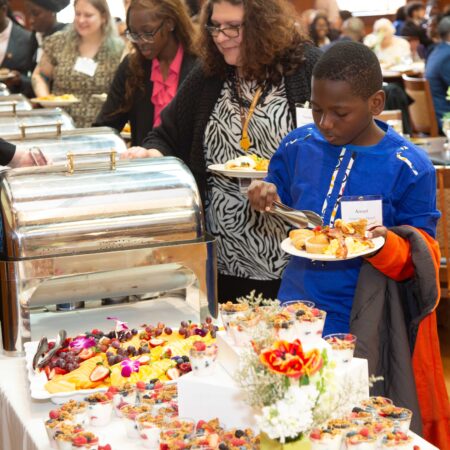 a group of people at a buffet