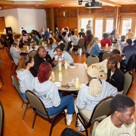 a group of people sitting at a table