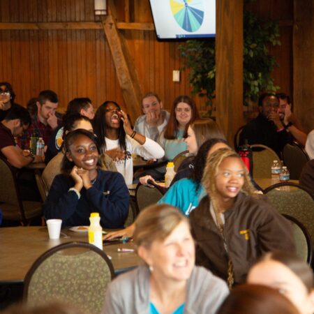 a group of people sitting in a room