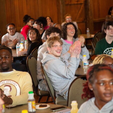 a group of people sitting at tables