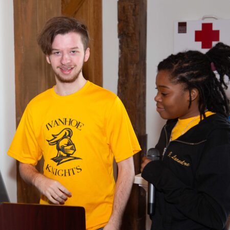 a person in a yellow shirt