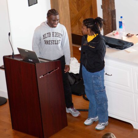people standing at a podium
