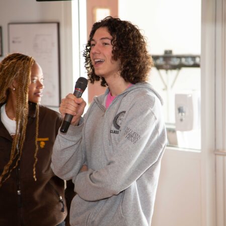 a person holding a microphone
