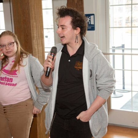a person holding a microphone