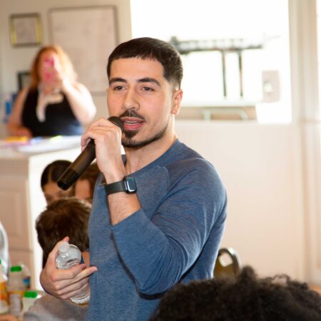 a person holding a microphone