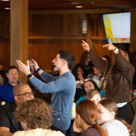 a person with his hands up in the air