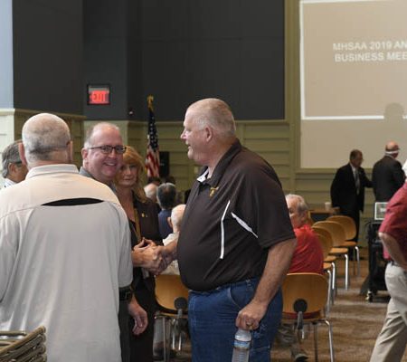 a group of people shaking hands