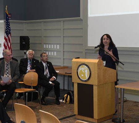 a person standing at a podium
