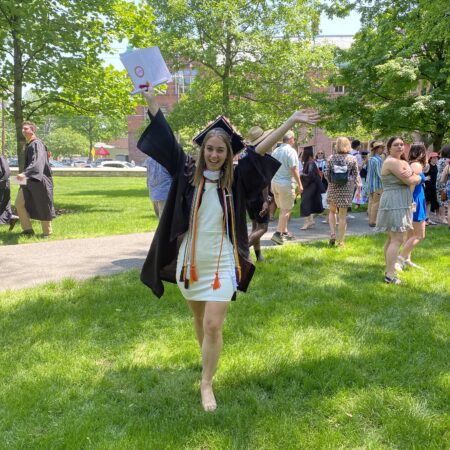 a person in a graduation cap and gown