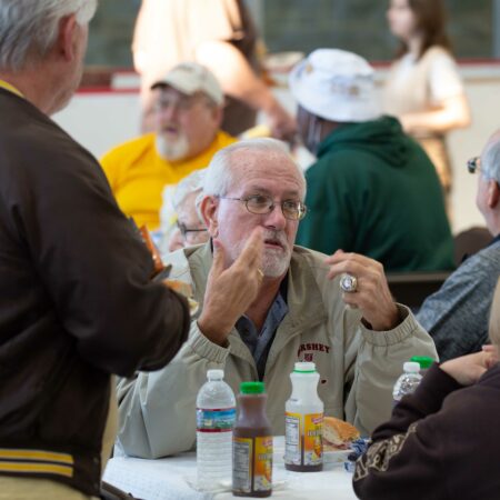 a group of people sitting at a table