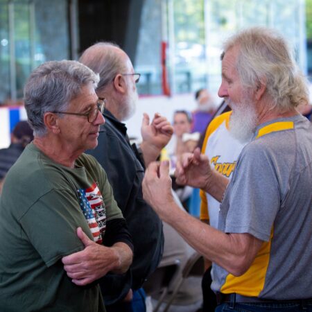 a group of men talking