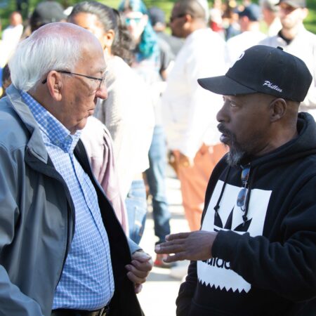 a group of men talking