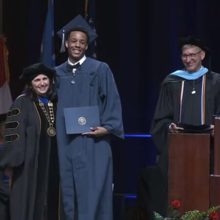 a group of people standing on podium