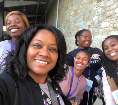 a group of women smiling for a selfie