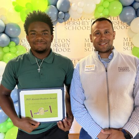 MHS senior Anthony Taylor receives the Spartan Pride Award from MHSAA.
