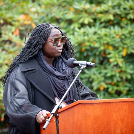 a person standing at a podium