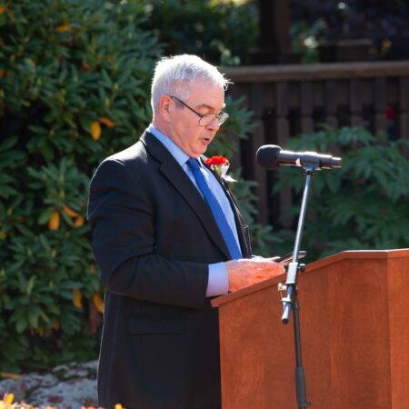a person standing at a podium