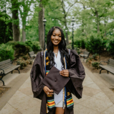 a person wearing a graduation gown