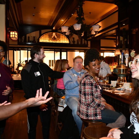 a group of people in a bar