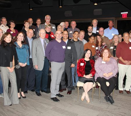 a group of people posing for a photo